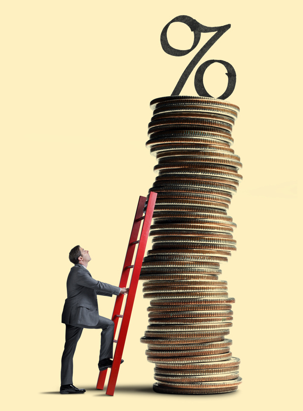 Man Leans Ladder Against Tall Stack Of Coins Topped With Interest Rate Symbol